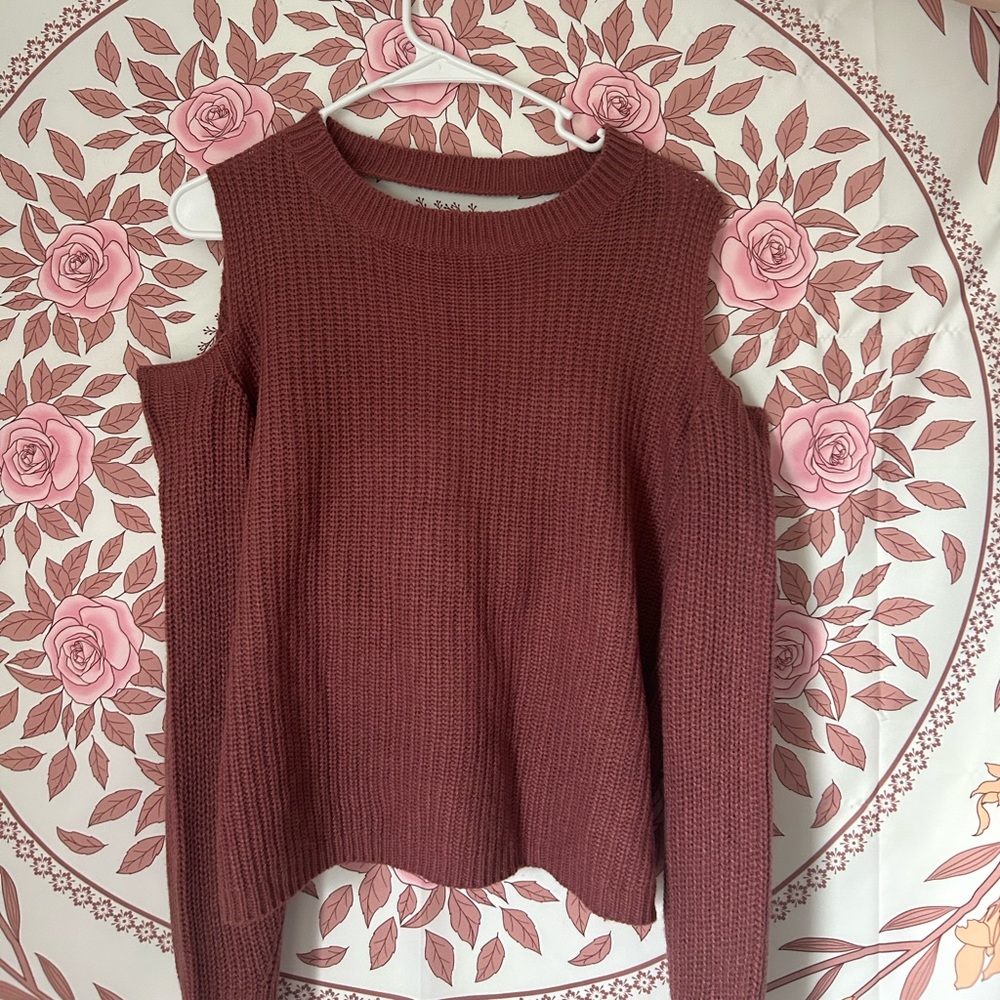 A pink  XL sized sweater shirt with two ways to wear. :)